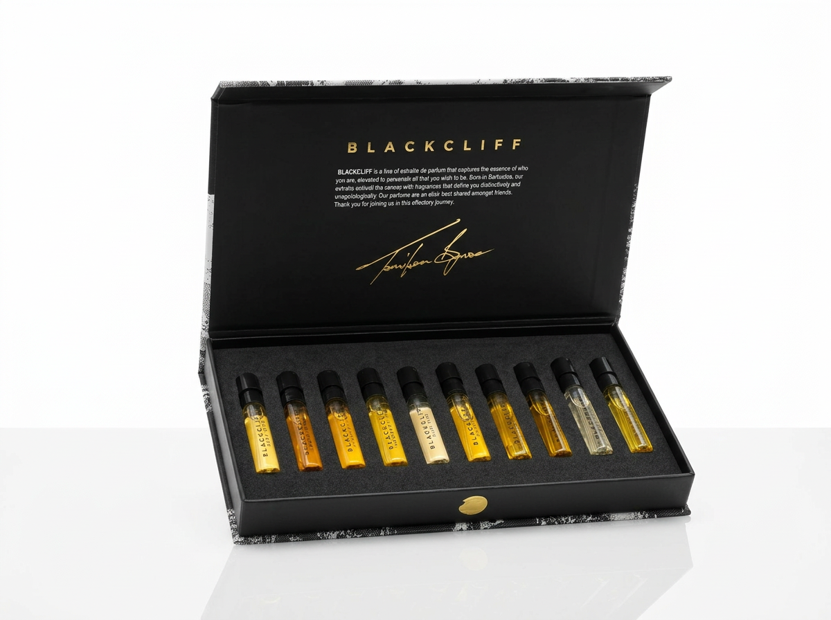 Open black box displaying 10 dropper vials with gold and clear liquid
